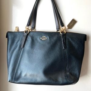 Brand new Coach zip top shoulder bag. Never used